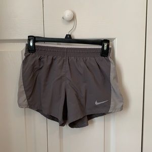 Grey Nike running shorts